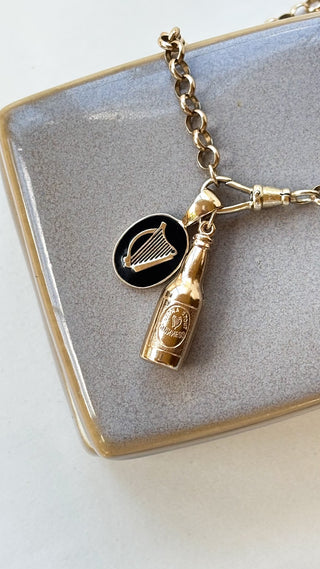 Resin and 9ct gold harp medal