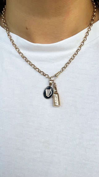 Resin and 9ct gold harp medal