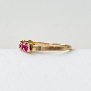 Seven Stone Band | 14ct Gold | Size M½ | 2.22g | Synthetic Pink Sapphire